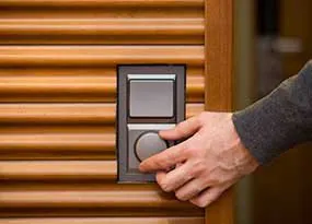 Hand on a light switch